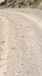 cailloux et sable... du bonheur pour dévisser les vélos et meurtrir nos fesses délicates